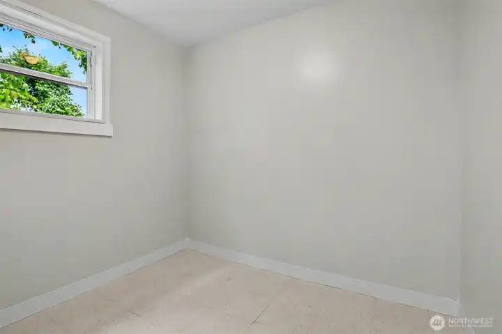 Off of the primary bathroom is a large space that could be used to extend the bathroom or another walk in closet.