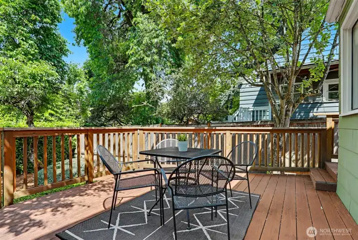 With access via the kitchen, the back deck is a great place to gather or relax.
