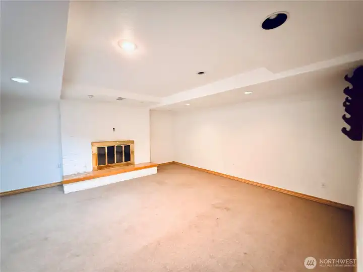 basement great room, fireplace, recessed lighting basement great room, fireplace, recessed lighting