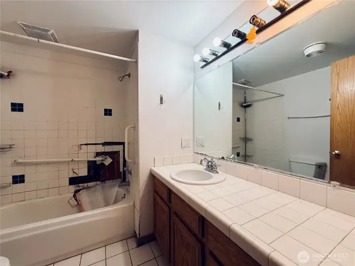 Basement full bathroom, large vanity, built in storage linen closet Basement full bathroom, large vanity, built in storage linen closet