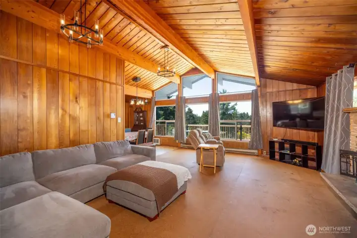 Picturesque windows in living room, add your own flooring Picturesque windows in living room, add your own flooring