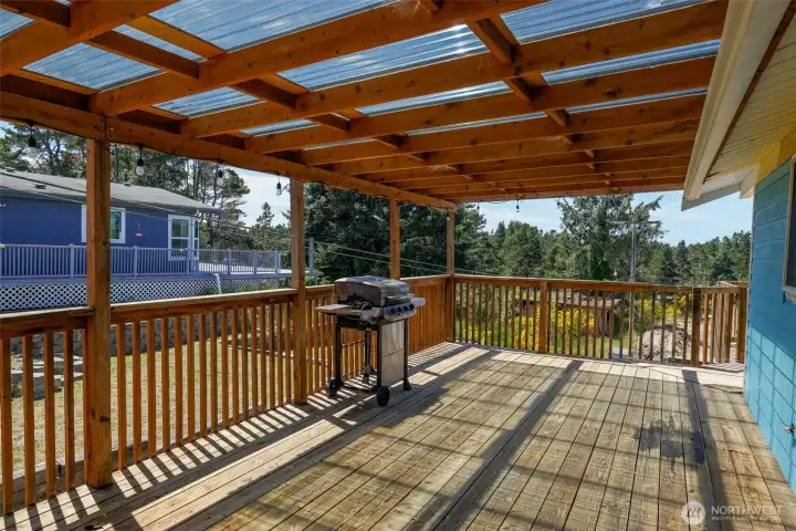 Deck off kitchen to BBQ and entertain Deck off kitchen to BBQ and entertain