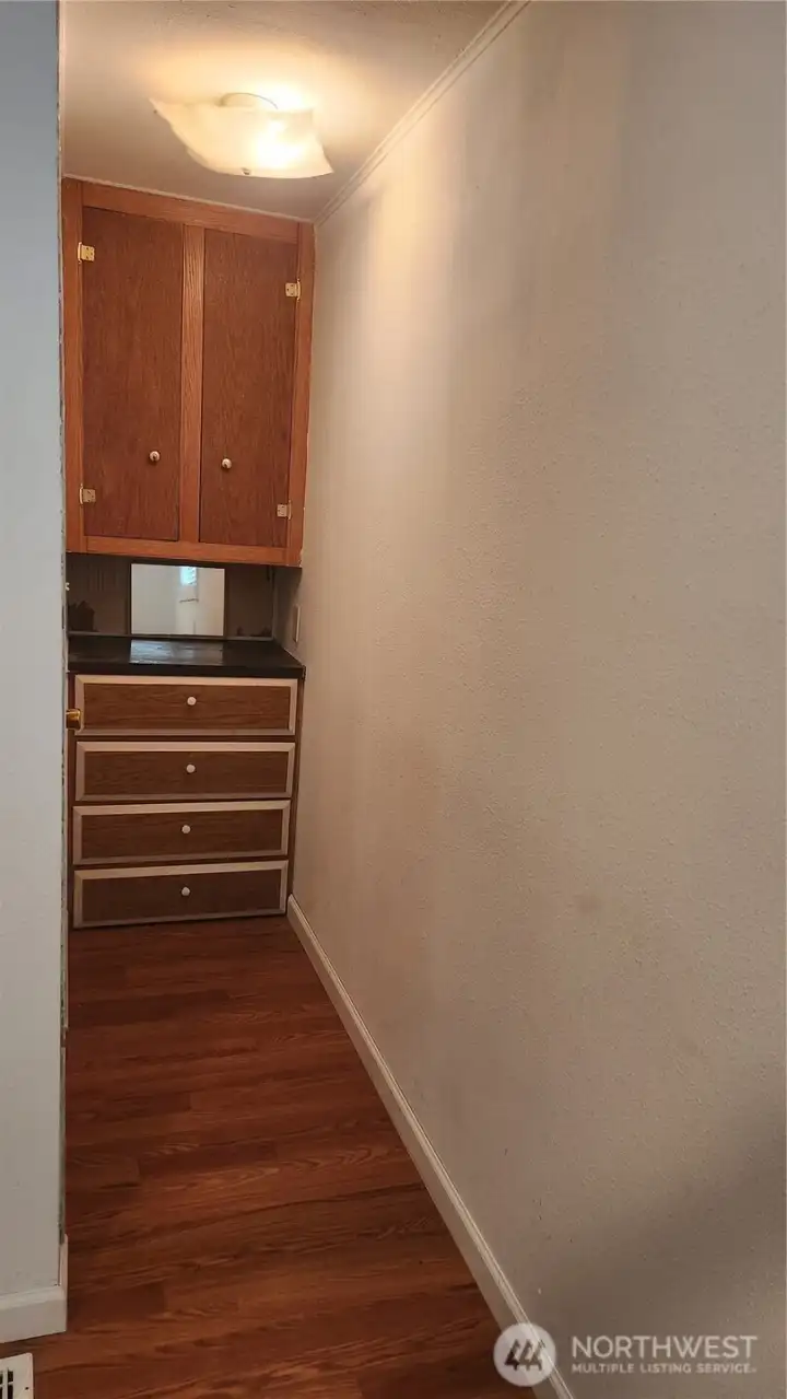 Dresser & Mirror outsideof walk-in closet