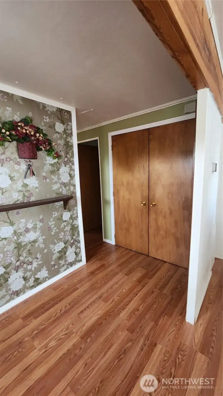 Hallway closet with storage