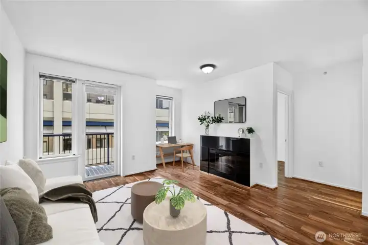This efficient unit features engineered wood floors and an outdoor terrace. (Virtually staged.) This efficient unit features engineered wood floors and an outdoor terrace. (Virtually staged.)