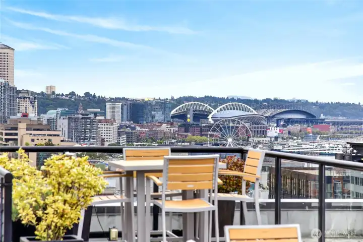 The stadiums and ferris wheel are in full view. The stadiums and ferris wheel are in full view.