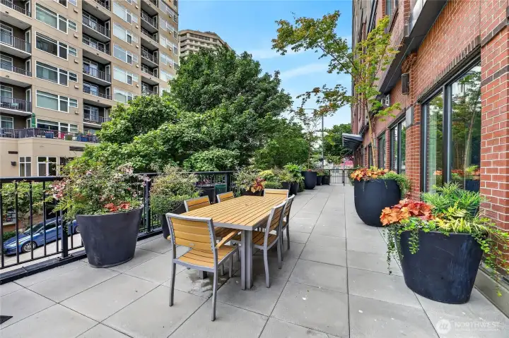Patio with grill and peek-a-boo views of the Sound are located off of the community lounge. Patio with grill and peek-a-boo views of the Sound are located off of the community lounge.
