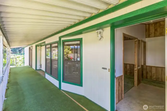 The covered front porch is large enough for outdoor furniture enjoyment year round!