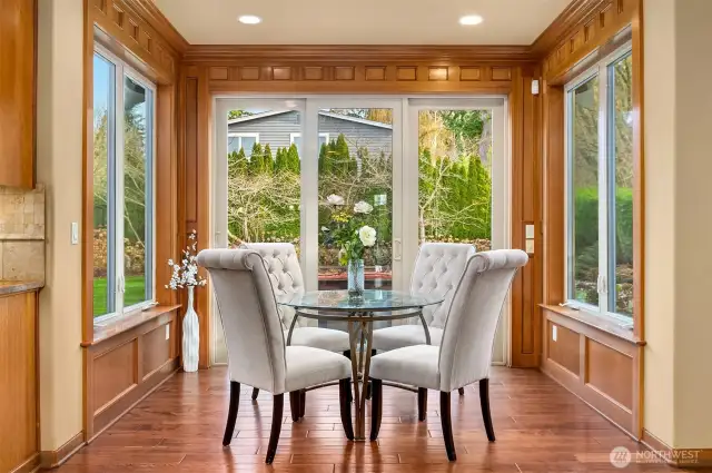 The kitchen, family room and this breakfast nook provides East-facing outlooks to the patio and back yard, and sunlit mornings.