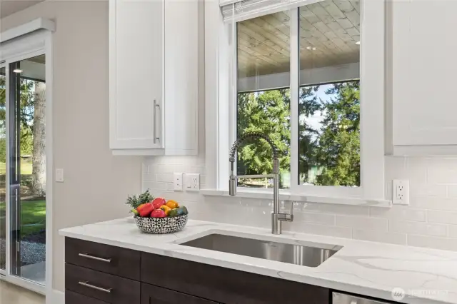 Kitchen sink looks out to backyard! For representation purposes only colors may vary.
