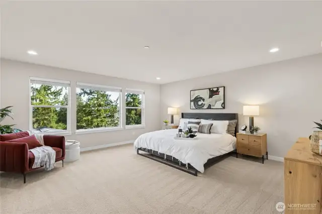 Top floor primary suite provides lots of natural light! Photos are for representational purposes only.