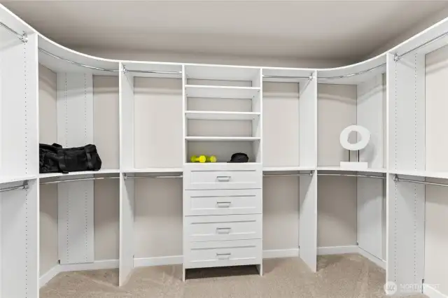 Spacious primary walk-in closet.