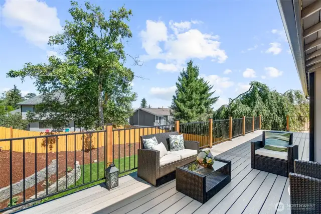 Deck extends across dining and primary bedroom.