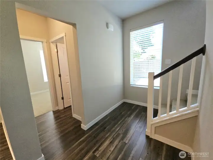 To the left is the 1/2 bath, and a bonus room for office space, exercise room, kids play room, home theater, game day?