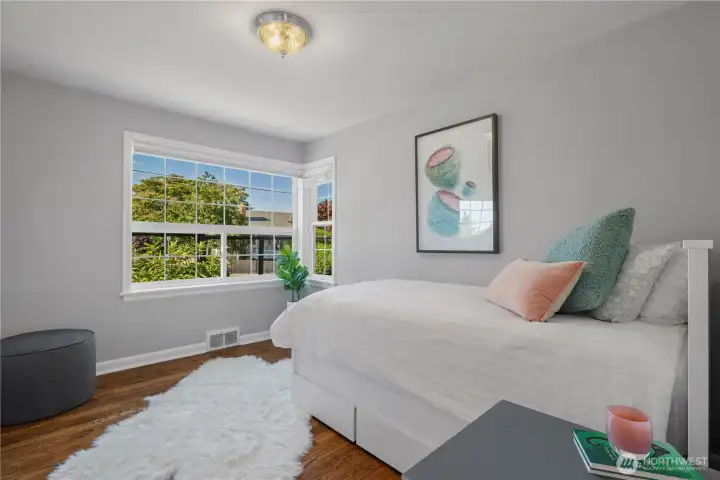 Middle bedroom with a corner window.