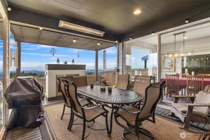Remarkable outdoor living retreat, fireplace, built-in heater, and views!!