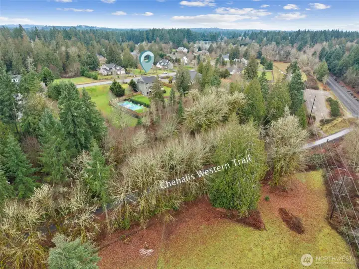 This home backs up to the Chehalis Western Trail with easy access through the neighborhood access point. Ride your bike to a winery this Summer.  What fun!