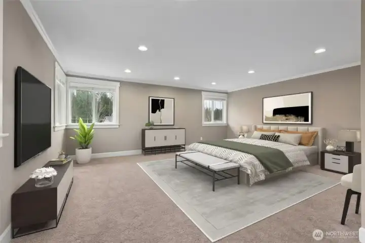 This primary suite is on a whole different scale. Measuring roughly 20 by 26, it feels more like a private retreat than a bedroom. Four windows flood the space with natural light, including a corner window moment that creates a panoramic view outside and makes the room feel even bigger. Muslin toned walls, wide white trim, and neutral carpeting keep the look calm and timeless. The TV and wall mount are included with the home, note that the virtually staged image shows a different TV than the one that stays, but the real setup is already in place and ready to go.