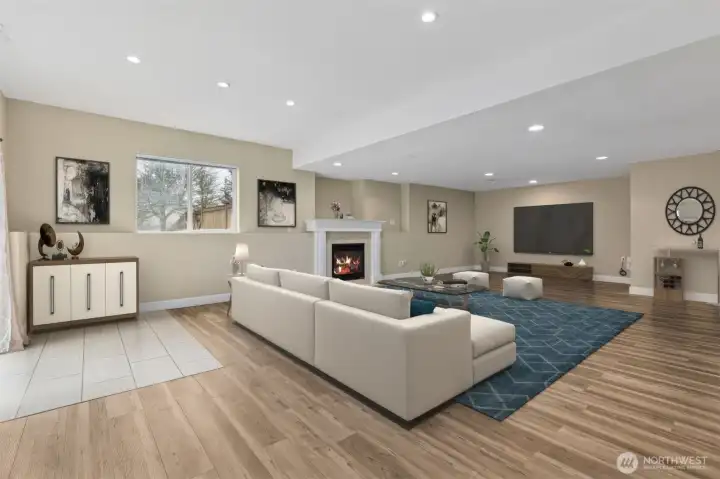 Downstairs, this huge finished recreation room provides space to gather and lounge, or fill this with ping pong and pool. Or add a wet bar down here to complete the entertainer's paradise.