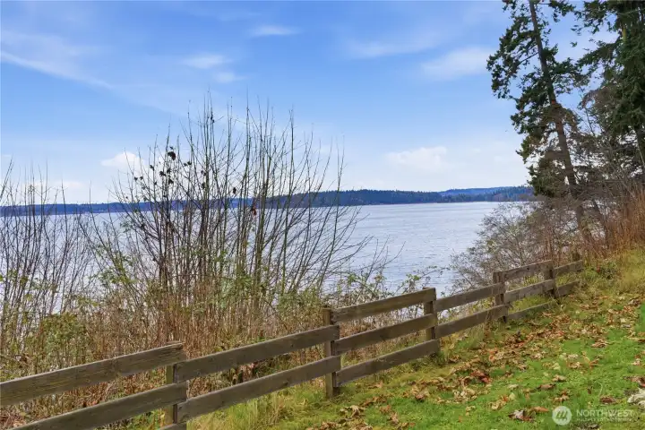 75 feet of high bank waterfront on this very private and peaceful property