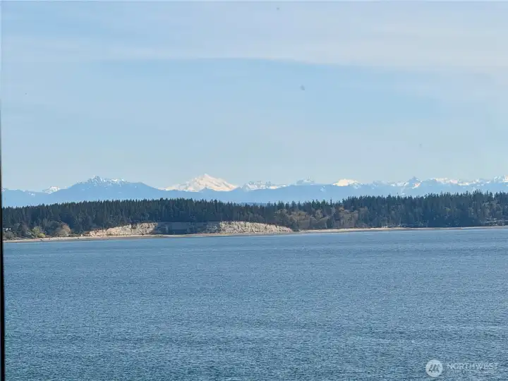 Enjoy water views overlookig the Hood Canal and mountain views of the Cascades & Glacier Peak!