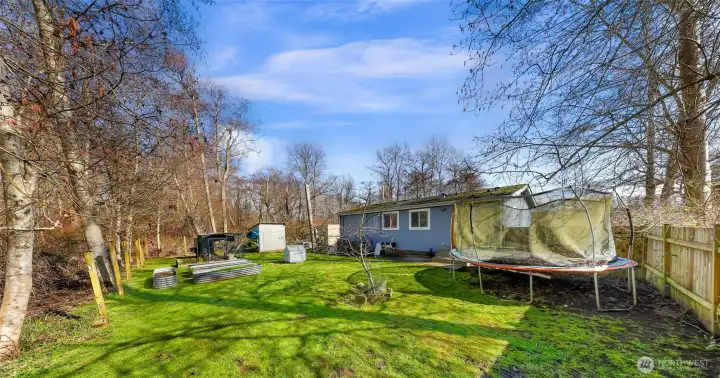 Partially fenced on side and ready when you are to complete!