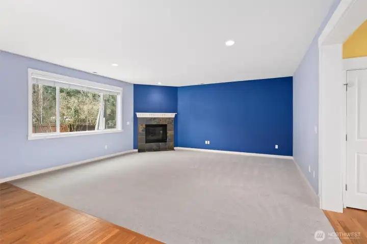 Large open concept family with gas fireplace