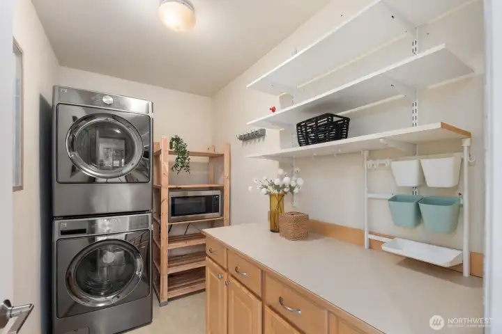 Laundry room with additional storage