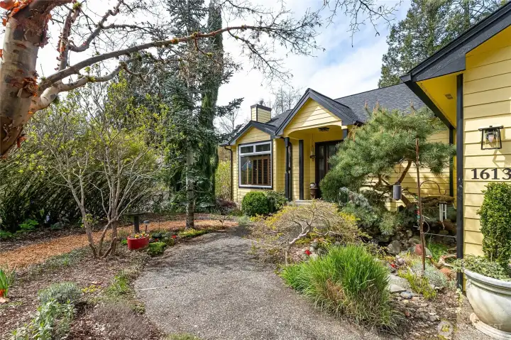 Peaceful and serene front entry with water feature