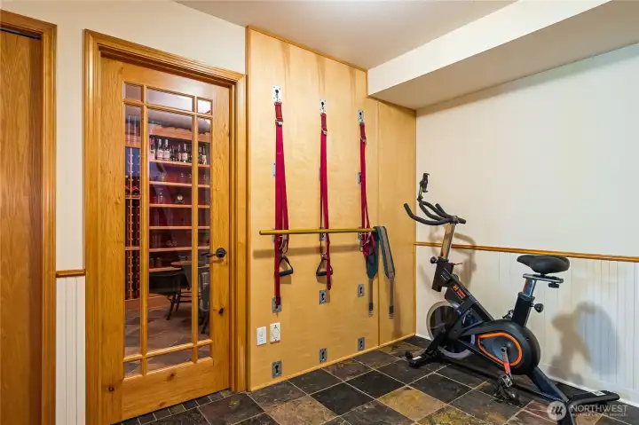 Pilates wall as you reach bottom of stairs