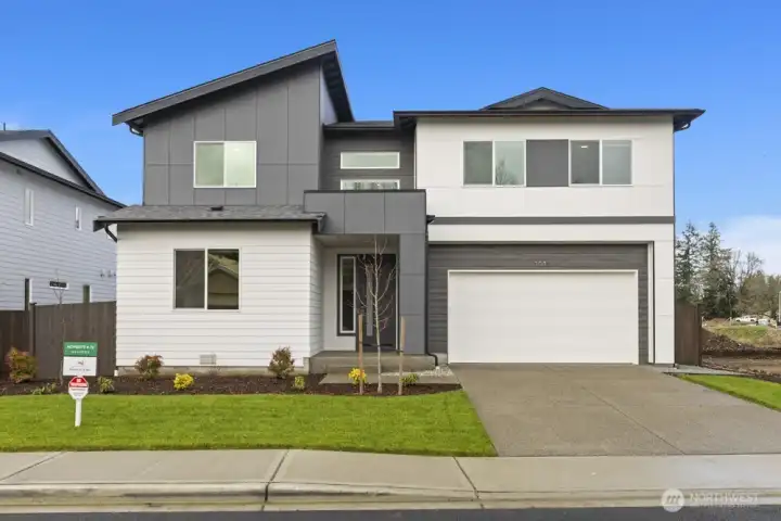 Photos of Model home. Not actual home. this home has a 3 car garage