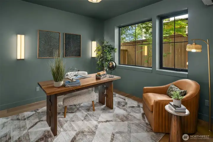 Main floor office/den is also a bedroom with access to a convenient bathroom Main floor office/den is also a bedroom with access to a convenient bathroom