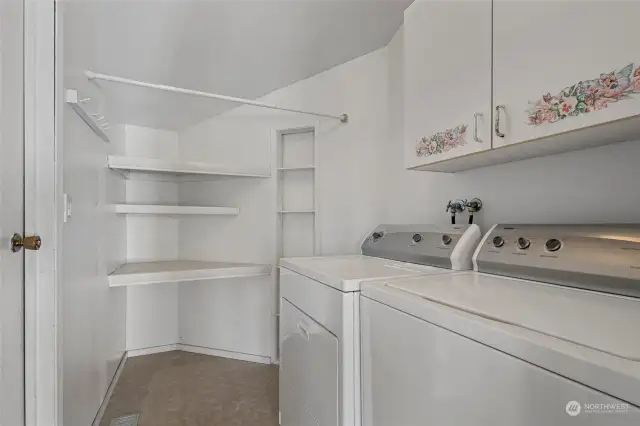Ample laundry/mud room off of the garage offers additional storage space.