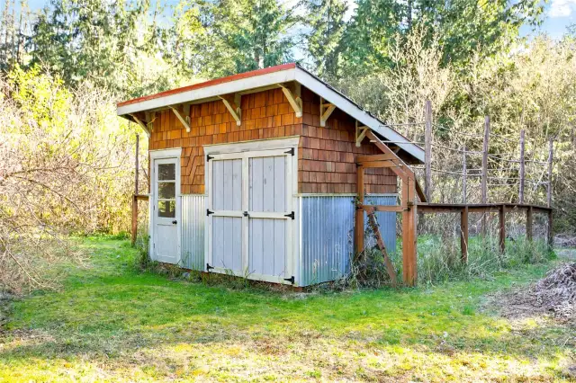 Garden shed can fit a riding lawn mower and many other gardening tools.  I think that was an old chicken coop area off of the back.