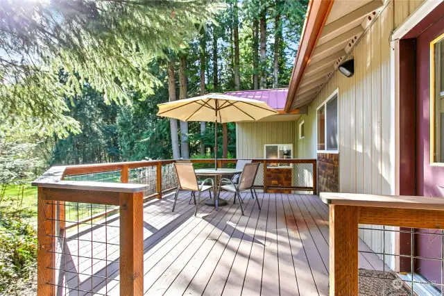 Beautiful back deck with composite decking. This looks out over the back yard area.