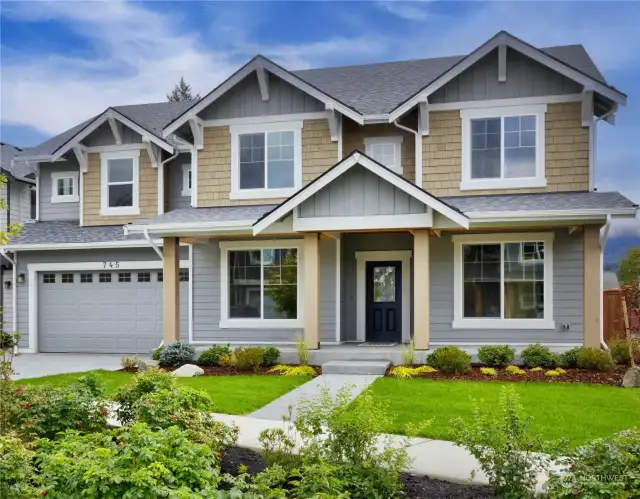 Previously built Aspen. Tolt Place Lot 2 features the same double gable and 12 x 12 Timbers on front porch.