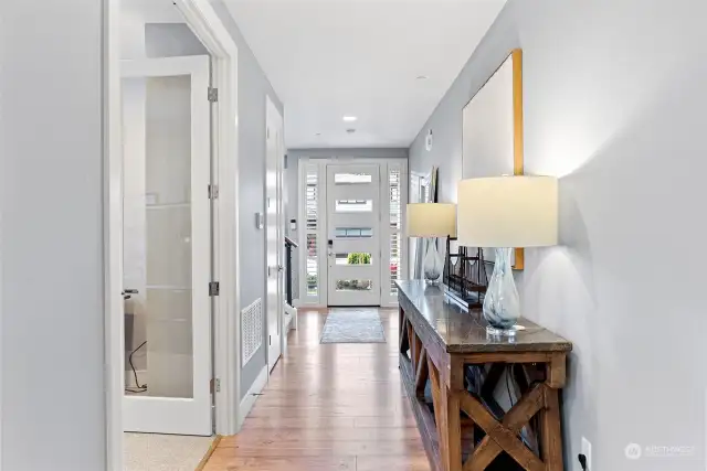 Entry is bright with modern lighting & gorgeous flooring throughout main floor.