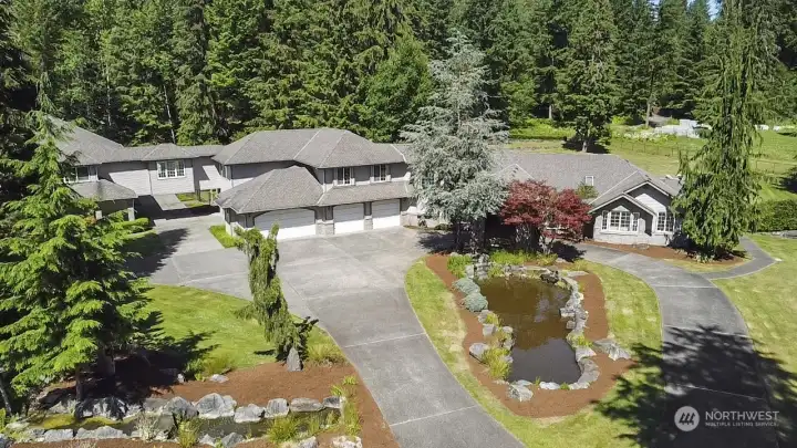 2 water features greet you as you enter through the main security gate (There's 3 gated entries in total.).  This is a magnificent, sprawling, estate.