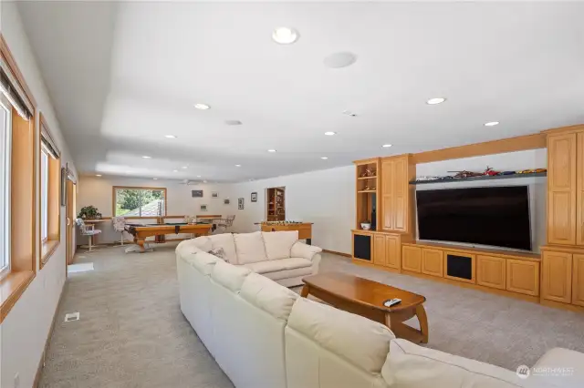 Currently used as a game room that's, directly, adjacent to the bar (I'm so blown away by how well this home is suited to entertainment AND efficient use of space. Truly an incredible, 1 of a kind, home.