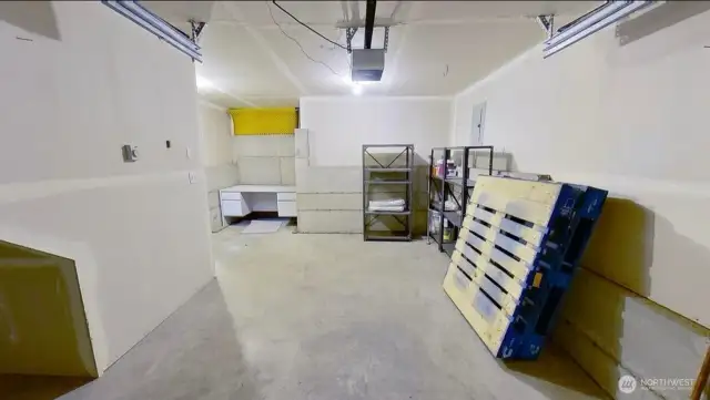 Photo of lower level fully finished secure private garage and storage.