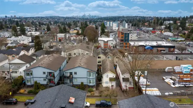 Townhome for sale right center forefront of photo looking south to downtown Seattle