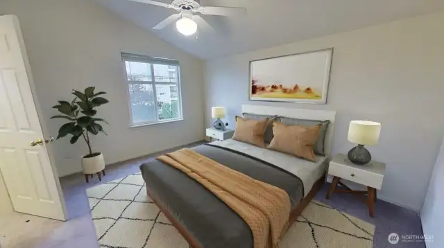 Upstairs master bedroom with vaulted ceiling and walk in closet.  Great room size, this close in home provides great utility for close in living or investment