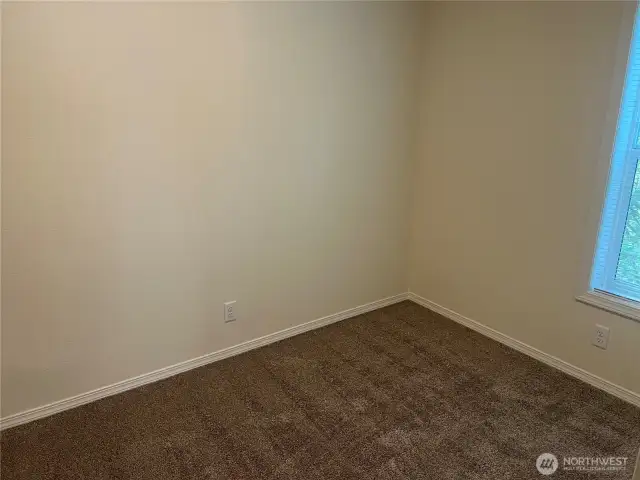 Second bedroom. Bedrooms are on opposite ends of the home.