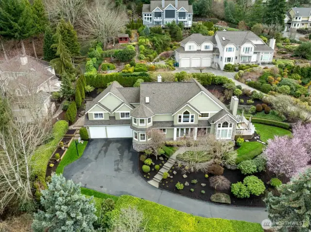 Garden beds, a water feature, a level yard and a view deck.  Surround yourself with beauty.