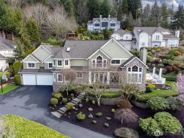 Hardiplank siding, a Presidential roof, pre-inspected, immaculately cared for, 3 car garage and a private beach along with Lake Sammamish views.