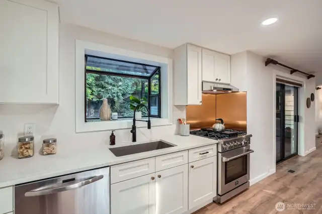 Kitchen sink overlooking your lovely backyard patio