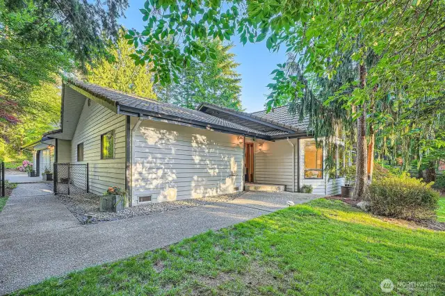 Front of the home is tucked away from the driveway