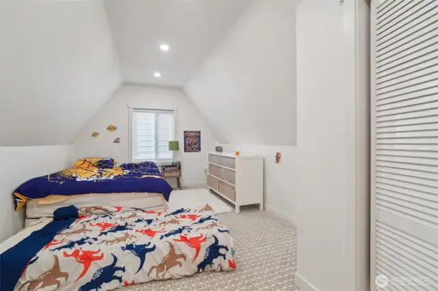 One of two second floor bedrooms