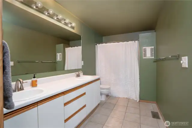 Double vanity and a generous amount of space to prep for the day.