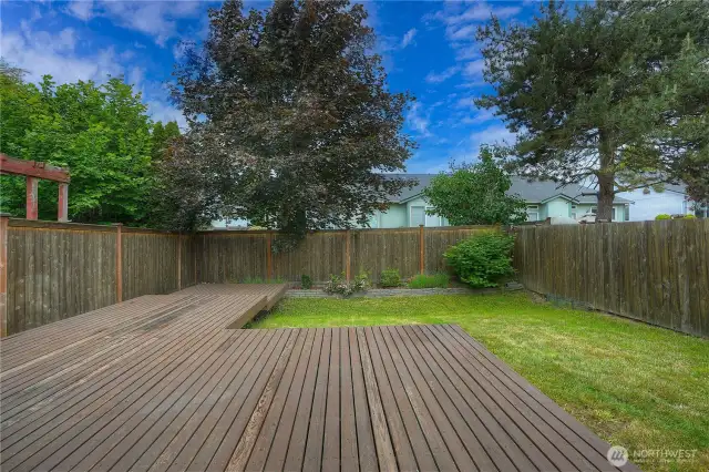 Barbeque just outside the back door on this large deck.